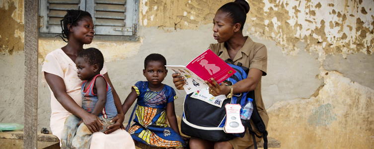 A community meeting is held to discuss health issues in Takradi, Ghana