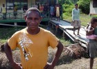 A volunteer teacher in front of the recently built Kokamu Parallel School in Dekai, Yahukimo District, Papua. 