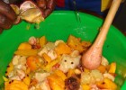 A fruit salad takes form during a nutrition education program at Rwanda’s Kibagabaga Hospital.