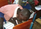 USAID's UNITY project, working with the Uganda Ministry of Education and Sports, is helping dyslexic children like Brian. 