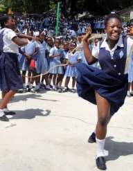 Schoolchildren jump rope at Ecole Marie Dominique Mazzarello in Port-au-Prince on June 18, 2010.