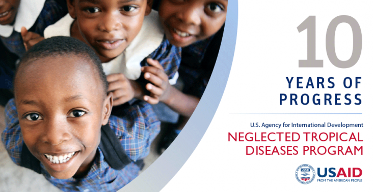 Cover of the 10 Years of Progress Report: USAID Neglected Tropical Diseases Program showing students looking up at the camera.