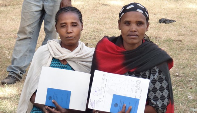 These two women in the village of Abeye, Ethiopia, obtained land certificates through a USAID program. After establishing rights