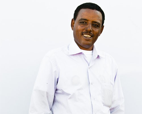 Abebaw Gessese, the owner of a poultry farm in Mojo, Ethiopia, received a $132,000 loan from Dashen Bank thanks to a USAID guara