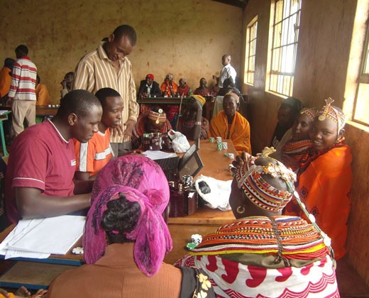 Teaching Kenyan pastoralists about livestock insurance.