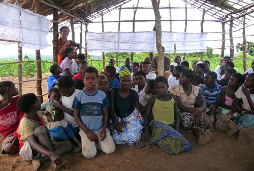 Through a USAID-promoted community association in Morrumbala, Mozambique, volunteers reinforce valuable lessons on health, hygie