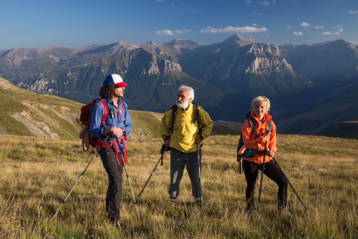 Via Dinarica hikers trek in Macedonia along the Šar Mountains.