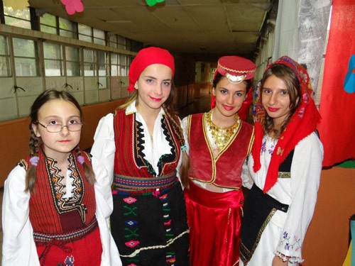 Students from the Zivko Brajkovski Primary School in Butel, Macedonia, wear traditional dress May 8, 2013, at ceremony celebrati