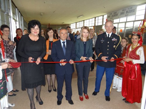 A ribbon-cutting ceremony on May 8, 2013, marks the opening of the Zivko Brajkovski Primary School in Butel, Macedonia. 