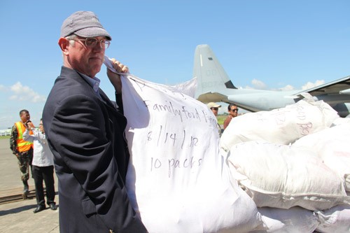 U.S. Embassy Deputy Chief of Mission Brian L. Goldbeck faciliated the turnover of relief items to Philippine Government official