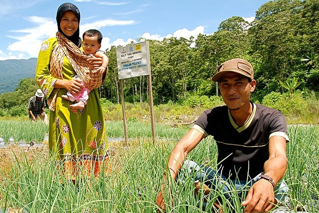 Indonesian family in farm feild