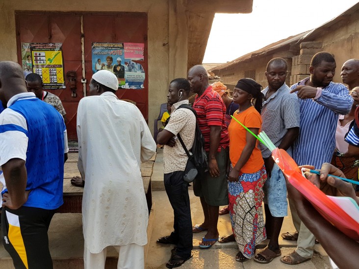 Ghanaians line up to cast their votes on Election Day.