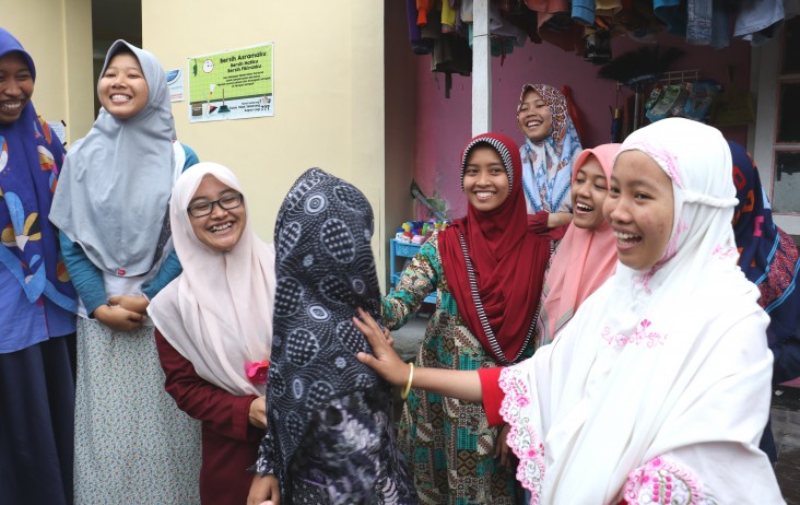 Dorm D supervising students, older girls who look after their younger peers, laugh as they share stories about their new facilities at the Ngalah Boarding School.