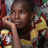 A young woman looking pensive