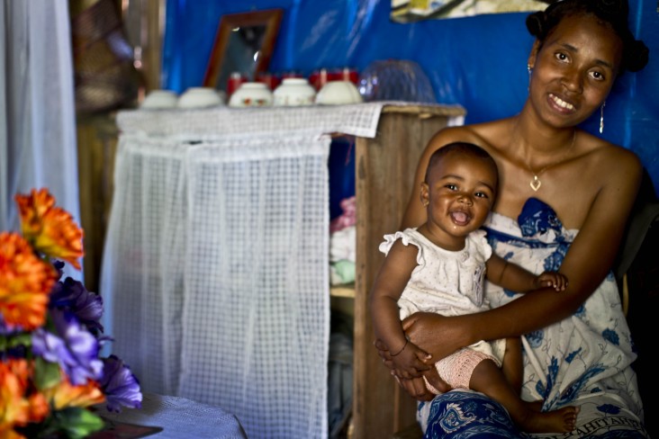 A woman and her baby after receiving counsel from a community health worker in their home in Boforene, Madagascar