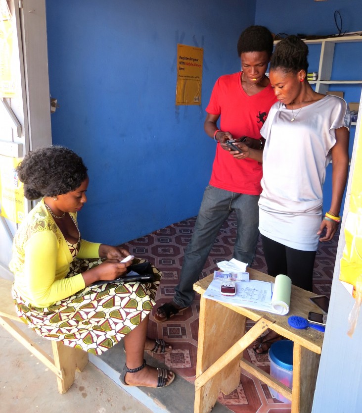 Female mobile money agents like Sylvia Awuni can be crucial in reaching women, who may be uncomfortable transacting with a male.