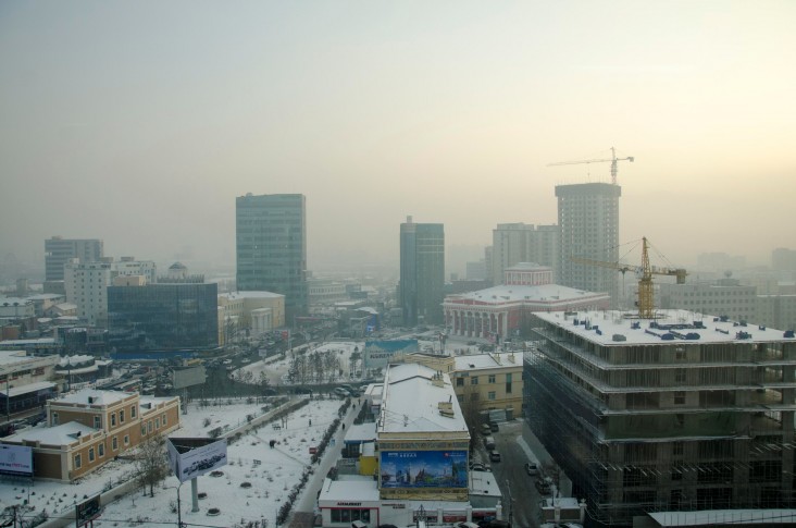 The blue skyline of Ulaanbaatar is littered with unfinished buildings and infamous winter air pollution.