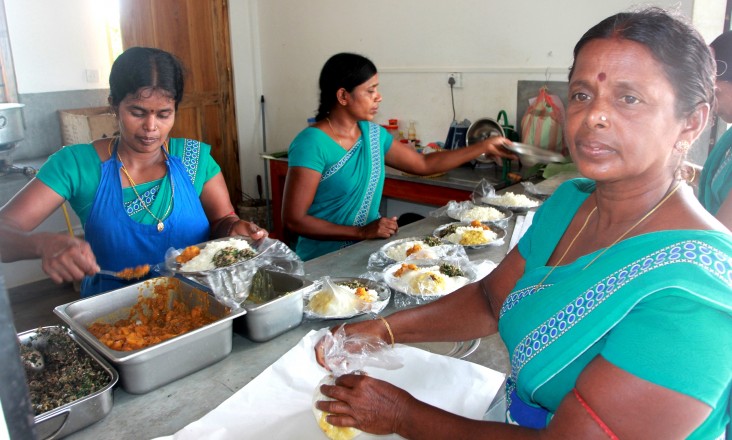 Women at the Taste of Vanni prepare themselves for another busy day.