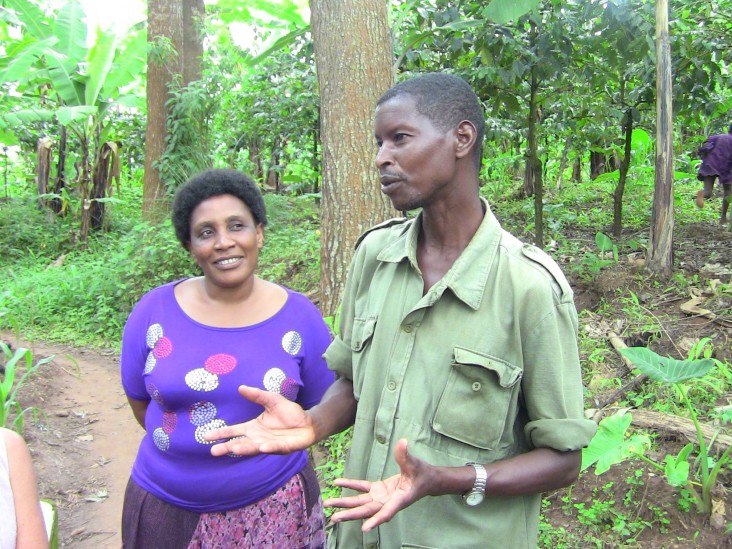 After receiving training from the USAID program, Bonaventura Luzilo, right, from the Tanzanian village of Kalinzi, started a tre