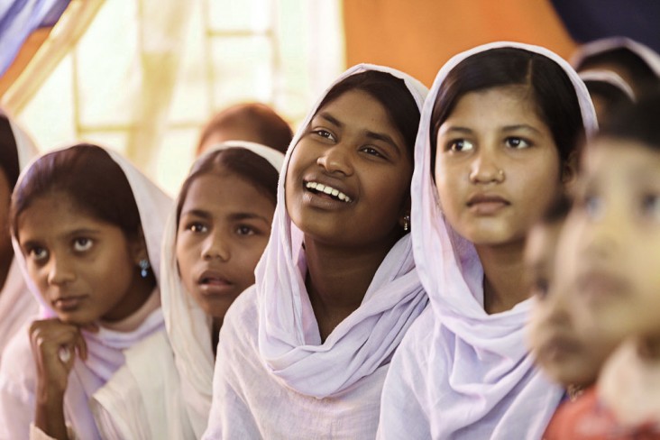 High school students​ in Bangladesh​ ​watch a​ film screening of I Was Worth 50 Sheep