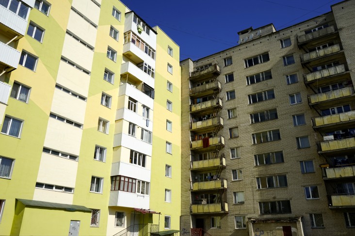 A tale of two buildings: the building after USAID provided energy efficient insulation (left); energy inefficient building right