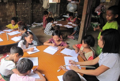 Image of children at a community learning center in Burma.