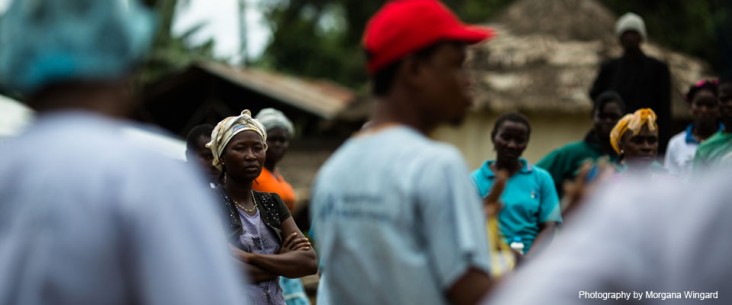 An Ebola response team from the Bong County Ebola treatment unit educates a town in Bong Mines about Ebola.