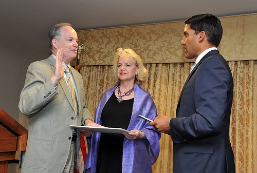 Administrator Rajiv Shah (right) swears in new Haiti Mission Director John Groarke. He was one of four new mission directors swo