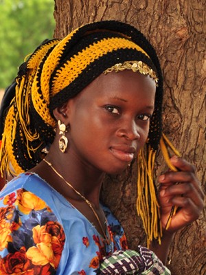 A young women in brightly colored clothing