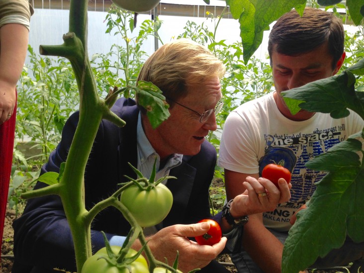 Giorgi Shavadze Shows Mission Director Ball His Greenhouses along the ABL