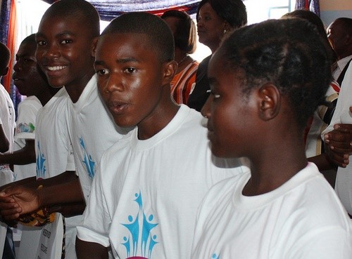 Young students from Lusaka's Chazanga Community celebrate the launch of USAID ZAMFAM