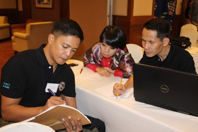 Philippine Coast Guard Officer discusses common maritime issues with Vietnam Coast Guard in a workshop by the ASEAN Wildlife Enf