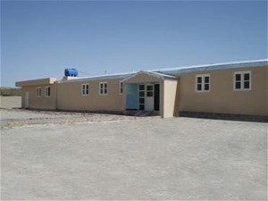 AFTER: Through USAID, the clinic received a major refurbishment and a newly constructed wing. The roof, building exterior, inter