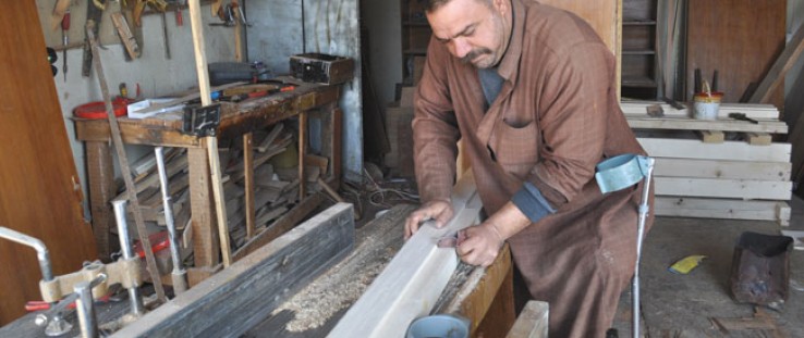 Faris Malik in his expanded Tikrit workshop. 