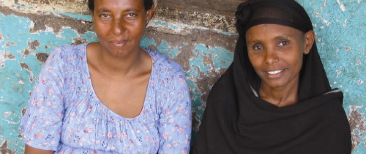 Yeshi Alem, left, educates her village about the perils of making girls marry young. She is seen here with one of the women she 