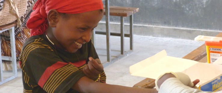 A young girl is tested for malaria during a school malaria survey in southern Ethiopia.