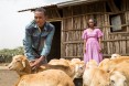 Borrowing with confidence. Thanks to her USAID-supported village economic and social association and its chairperson, Etsay Wayu (right), Sindayo Belay (left) gained the knowledge, skills, and confidence she needed to take a loan and turn her life around.