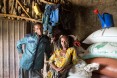 As a model farmer and VESA (village economic and social association) chairperson, Etsay Wayu (left) helps his fellow VESA members gain the knowledge, skills, and confidence they need to turn their lives around. Here Etsay and his wife, Mulu Girmay, are pictured in their store room. Thanks to USAID, they have learned new ways to manage their farm and earn and manage their income. As a result of all they learned, the family now has their own safety net: more than a year's worth of food in storage.