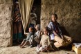 The children of USAID beneficiaries Yubo Kereyu and Barude Keweti. Discussions about gender and social norms within the village economic and social association have encouraged their parents to share household chores and childcare. When they do, everyone benefits.