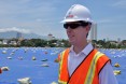 USAID Mission Director Joakim Parker assesses progress at the Environmental Remediation of Dioxin Contamination Project at Danan