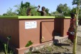 Beneficiary using water tap provided by USAID-funded JSI/Mahefa project