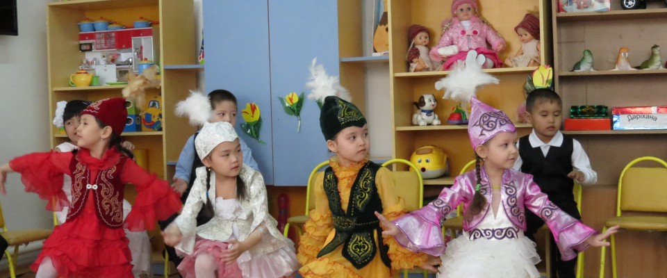 Children share local traditions at a celebration of new assistance from USAID.