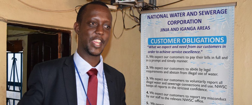 Paul Isagara, Iganga Area Manager for the Uganda National Water and Sewerage Corporation, speaking at a customer engagement workshop. Photo Credit: USAID/East Africa