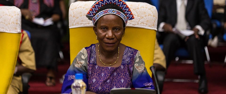 A photo is displayed of a Zambian chieftainess who attended the first-ever forum for women traditional leaders.