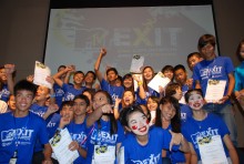 Students from Burma and Thailand celebrate after performing anti-trafficking awareness scenes and graduating from the first-ever