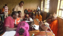 Kenyan pastoralists learn about livestock insurance.