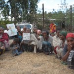 A women’s care group gathers to discuss health and nutrition practices. 