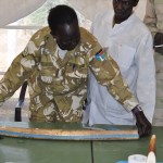 Ministry of Wildlife officials work with USAID partners to catalog and test confiscated elephant tusks.