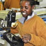 A Tikur Abbay employee constructs a shoe for U.S. retailer Bass.