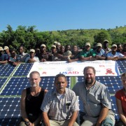 Technicians wire up solar panels as part of a hands-on training in Boucan Carré, Haiti.